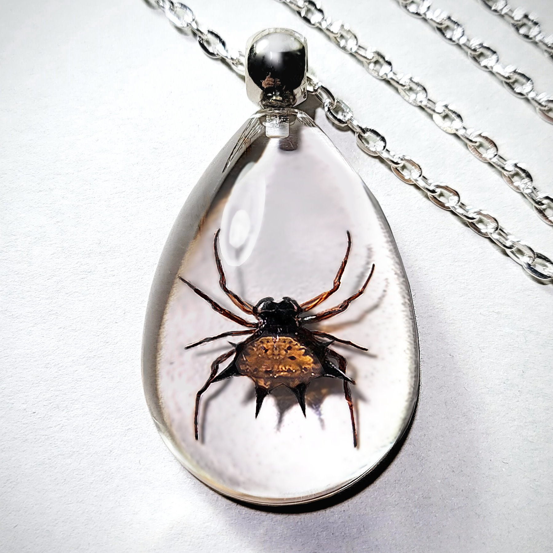 Amazon.com: Black Widow Necklace, Hourglass Symbol Logo, Halloween Spider  Jewelry, Goth Pendant Necklace : Handmade Products